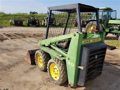 john deere 90 skid steer attachments|john deere 90 skid steer specs.